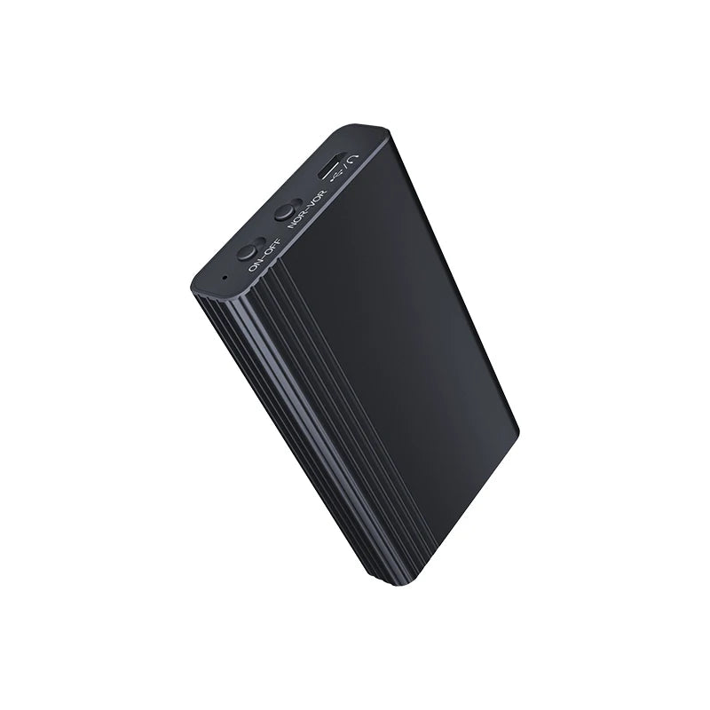 The image shows a compact black rectangular mini voice recorder, emphasizing its discreet design. It features icons for a "Smart chip," "128G" memory expansion, "Magnetic adsorption," and "HD recording." A hand holding the device illustrates its small size, suitable for easy concealment and portability. The text "500H" indicates its capability of recording up to 500 hours. The overall presentation highlights its advanced features, making it ideal for long-term surveillance or personal use.