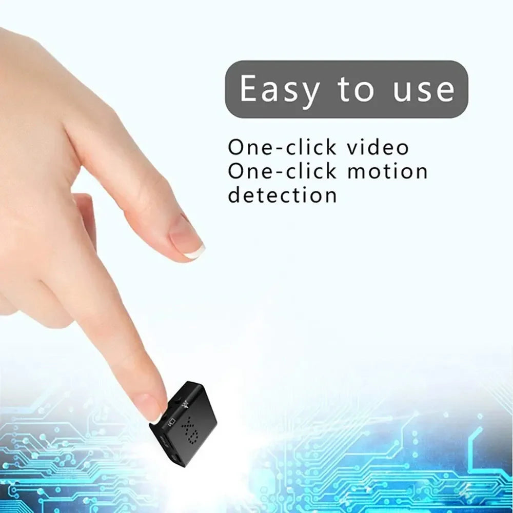A hand is shown pressing a small black 1080P Spy Tech Camera against a light blue background with circuit patterns. The text above reads, "Easy to use - One-click video, One-click motion detection, 1080P HD.