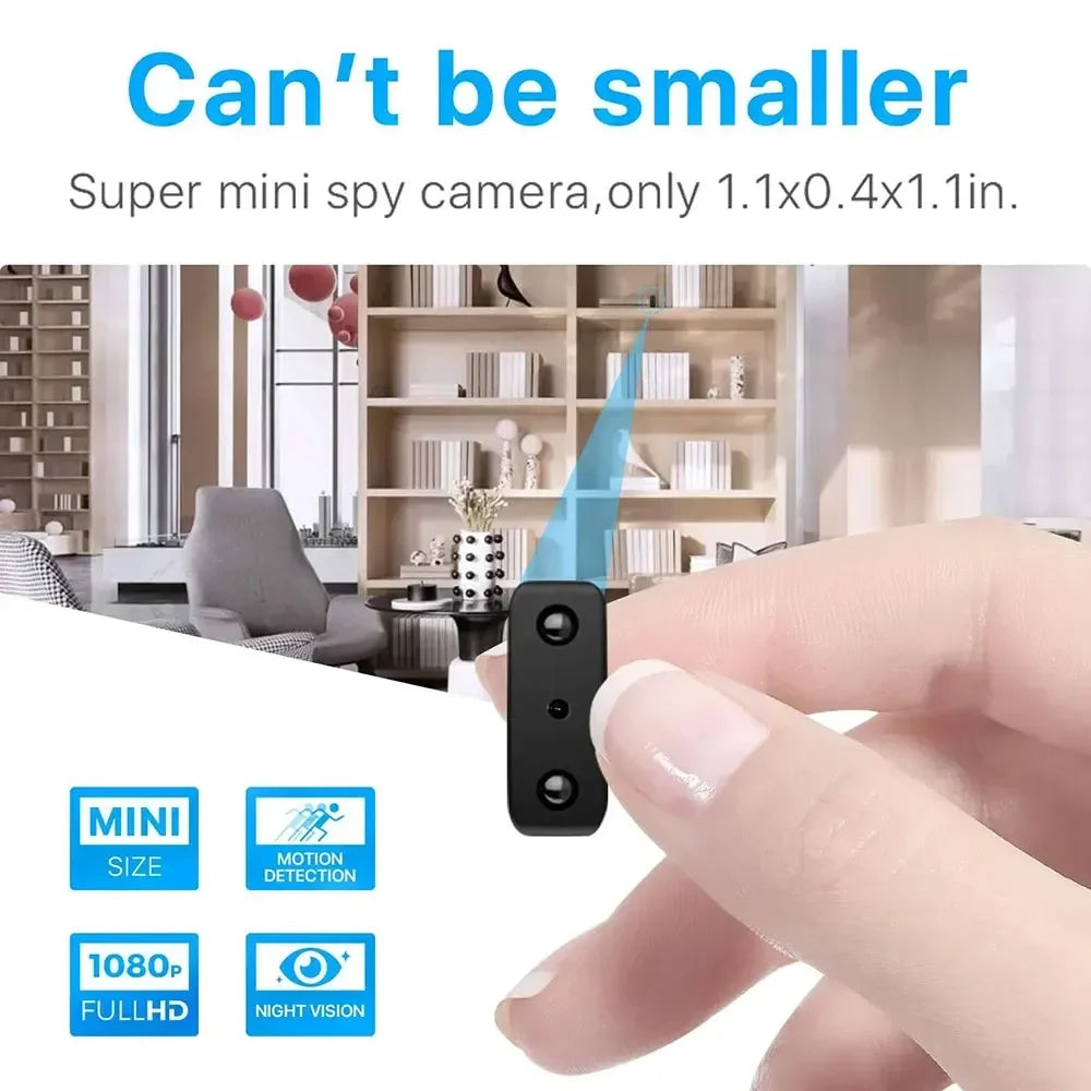 A person holds a Spy Tech Mini 1080P Camera measuring 1.1 x 0.4 x 1.1 inches against a modern living room and kitchen backdrop. The image highlights features like motion detection, 1080p Full HD, night vision, and its ultra-compact size. Text reads: "Can't be smaller.